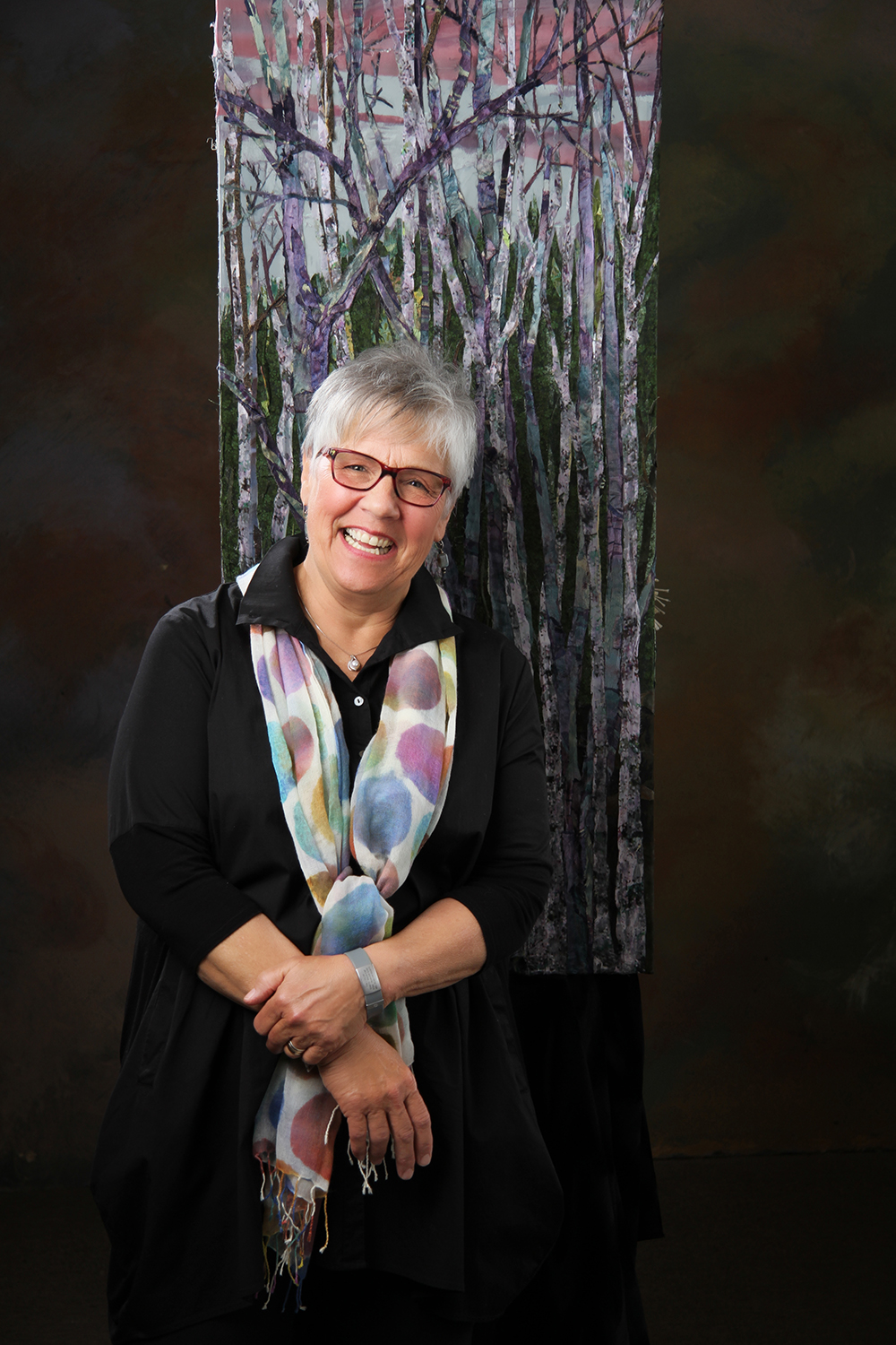 Pam Collins Headshot with Birch Trees