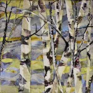 A close up of the fabric art New Home Birches by Pam Collins